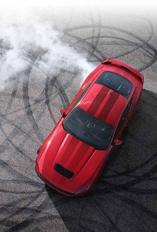 Overhead view of a 2024 Ford Mustang® model with tire tracks on pavement | Ed Morse Ford Red Bud in Red Bud IL