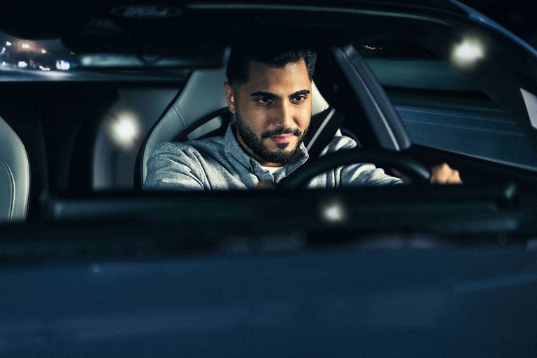 Person sitting in the driver’s seat of a parked 2024 Ford Mustang® coupe | Ed Morse Ford Red Bud in Red Bud IL